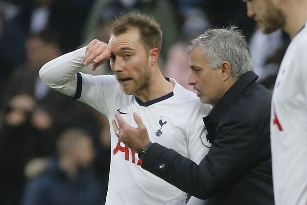 Tottenham Hotspur's Portuguese head coach Jose Mourinho (R) speaks to Tottenham Hotspur's Danish midfielder Christian Eriksen during the English Premier League football match between Tottenham Hotspur and Brighton and Hove Albion at Tottenham Hotspur Stadium in London, on December 26, 2019. (Photo by Tolga AKMEN / AFP) / RESTRICTED TO EDITORIAL USE. No use with unauthorized audio, video, data, fixture lists, club/league logos or 'live' services. Online in-match use limited to 120 images. An additional 40 images may be used in extra time. No video emulation. Social media in-match use limited to 120 images. An additional 40 images may be used in extra time. No use in betting publications, games or single club/league/player publications. /  (Photo by TOLGA AKMEN/AFP via Getty Images)