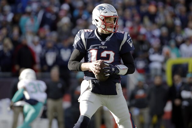 New England Patriots quarterback Tom Brady drops back to pass against the Miami Dolphins in the first half of an NFL football game, Sunday, Dec. 29, 2019, in Foxborough, Mass. (AP Photo/Elise Amendola) New England Patriots quarterback Tom Brady drops back to pass against the Miami Dolphins in the first half of an NFL football game, Sunday, Dec. 29, 2019, in Foxborough, Mass. (AP Photo/Elise Amendola)