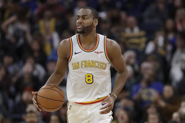 Golden State Warriors guard Alec Burks (8) brings the ball up during the second half of the team's NBA basketball game against the Minnesota Timberwolves in San Francisco, Monday, Dec. 23, 2019. (AP Photo/Jeff Chiu)