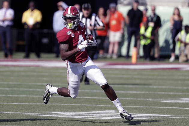 Alabama wide receiver Jerry Jeudy (4) runs after a reception against Michigan during the first half of the Citrus Bowl NCAA college football game, Wednesday, Jan. 1, 2020, in Orlando, Fla. (AP Photo/John Raoux)
