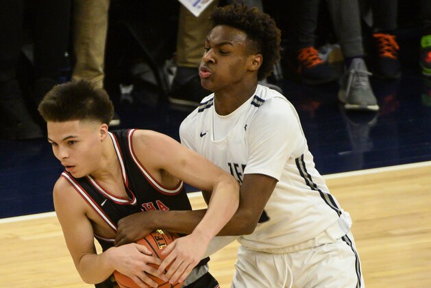 MINNEAPOLIS, MINNESOTA - JANUARY 04: Bronny James #0 of Sierra Canyon Trailblazers defends Donovan Smith #5 of Minnehaha Academy Red Hawks in the first half of the game at Target Center on January 04, 2020 in Minneapolis, Minnesota. (Photo by Stephen Maturen/Getty Images)
