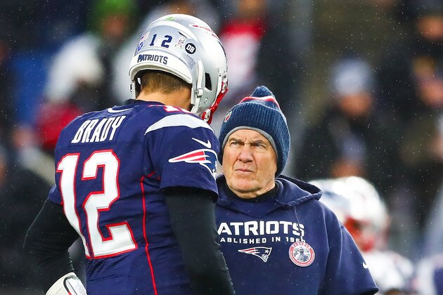 FOXBOROUGH, MA - NOVEMBER 24: Tom Brady #12 talks to head coach Bill Belichick of the New England Patriots before a game against the Dallas Cowboys at Gillette Stadium on November 24, 2019 in Foxborough, Massachusetts. (Photo by Adam Glanzman/Getty Images)