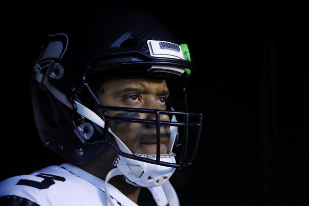 Seattle Seahawks' Russell Wilson waits to run onto the field before an NFL wild-card playoff football game against the Philadelphia Eagles, Sunday, Jan. 5, 2020, in Philadelphia. (AP Photo/Matt Rourke)