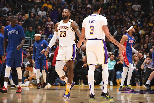 LOS ANGELES, CA - JANUARY 5: LeBron James #23 and Anthony Davis #3 of the Los Angeles Lakers hi-five during the game against the Detroit Pistons  on January 5, 2020 at STAPLES Center in Los Angeles, California. NOTE TO USER: User expressly acknowledges and agrees that, by downloading and/or using this Photograph, user is consenting to the terms and conditions of the Getty Images License Agreement. Mandatory Copyright Notice: Copyright 2020 NBAE (Photo by Andrew D. Bernstein/NBAE via Getty Images)