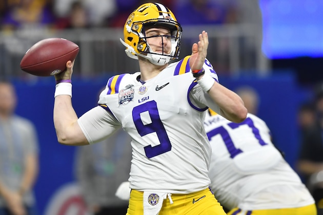 LSU quarterback Joe Burrow (9) works against Oklahoma during the first half of the Peach Bowl NCAA semifinal college football playoff game, Saturday, Dec. 28, 2019, in Atlanta. (AP Photo/John Amis)