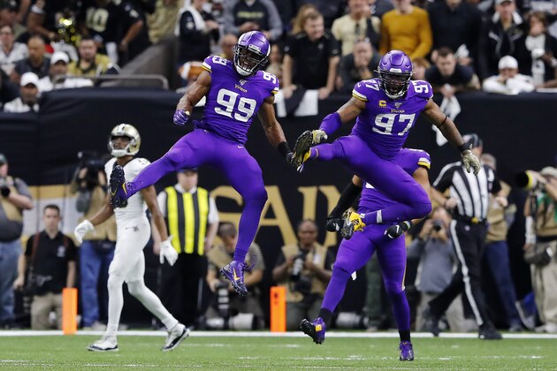 NEW ORLEANS, LOUISIANA - JANUARY 05: Danielle Hunter #99 and Everson Griffen #97 of the Minnesota Vikings celebrate during the first half against the New Orleans Saints in the NFC Wild Card Playoff game at Mercedes Benz Superdome on January 05, 2020 in New Orleans, Louisiana. (Photo by Kevin C. Cox/Getty Images)