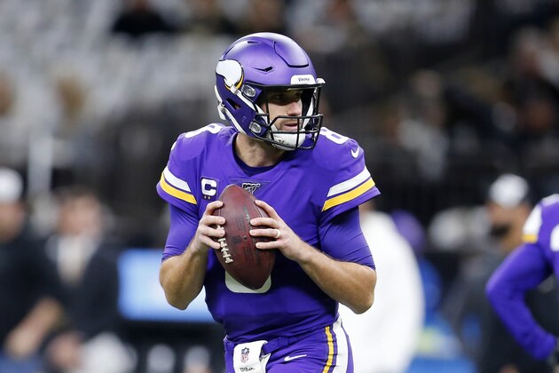 Minnesota Vikings quarterback Kirk Cousins (8) warms up before an NFL wild-card playoff football game against the New Orleans Saints, Sunday, Jan. 5, 2020, in New Orleans. (AP Photo/Brett Duke)