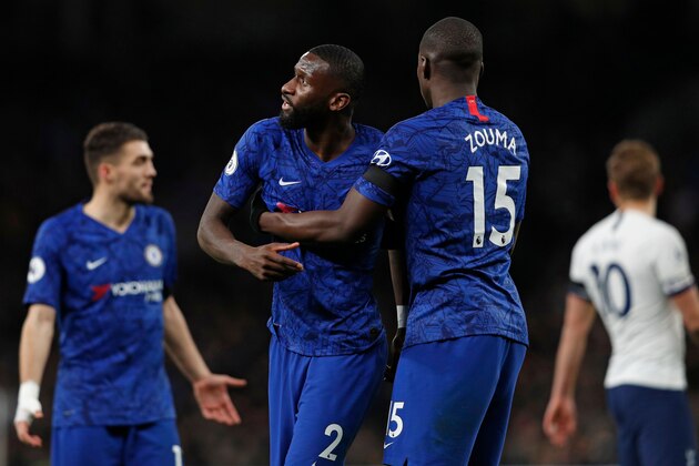 Chelsea's French defender Kurt Zouma (R) and Chelsea's German defender Antonio Rudiger (2nd L) reacts during the English Premier League football match between Tottenham Hotspur and Chelsea at Tottenham Hotspur Stadium in London, on December 22, 2019. (Photo by Adrian DENNIS / AFP) / RESTRICTED TO EDITORIAL USE. No use with unauthorized audio, video, data, fixture lists, club/league logos or 'live' services. Online in-match use limited to 120 images. An additional 40 images may be used in extra time. No video emulation. Social media in-match use limited to 120 images. An additional 40 images may be used in extra time. No use in betting publications, games or single club/league/player publications. /  (Photo by ADRIAN DENNIS/AFP via Getty Images)