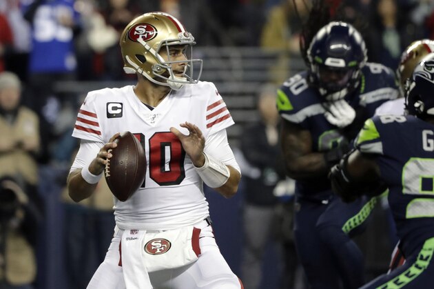 San Francisco 49ers quarterback Jimmy Garoppolo drops back to pass against the Seattle Seahawks during the first half of an NFL football game, Sunday, Dec. 29, 2019, in Seattle. (AP Photo/Ted S. Warren)