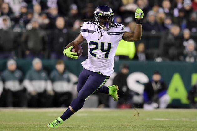 PHILADELPHIA, PENNSYLVANIA - JANUARY 05: Marshawn Lynch #24 of the Seattle Seahawks carries the ball for a first down in the third quarter of the NFC Wild Card Playoff game against the Philadelphia Eagles  at Lincoln Financial Field on January 05, 2020 in Philadelphia, Pennsylvania. (Photo by Steven Ryan/Getty Images)