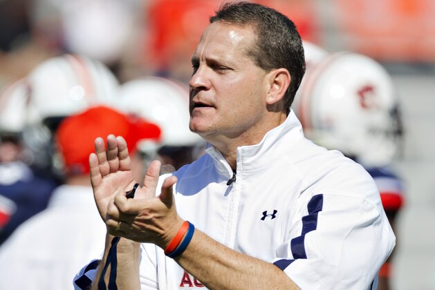 AUBURN, AL - OCTOBER 6:  Head Coach Gene Chizik of the Auburn Tigers watches his team warm up before a game against the Arkansas Razorbacks at Jordan-Hare Stadium on October 6, 2012 in Auburn, Alabama.  The Razorbacks defeated the Tigers 24-7.  (Photo by Wesley Hitt/Getty Images)