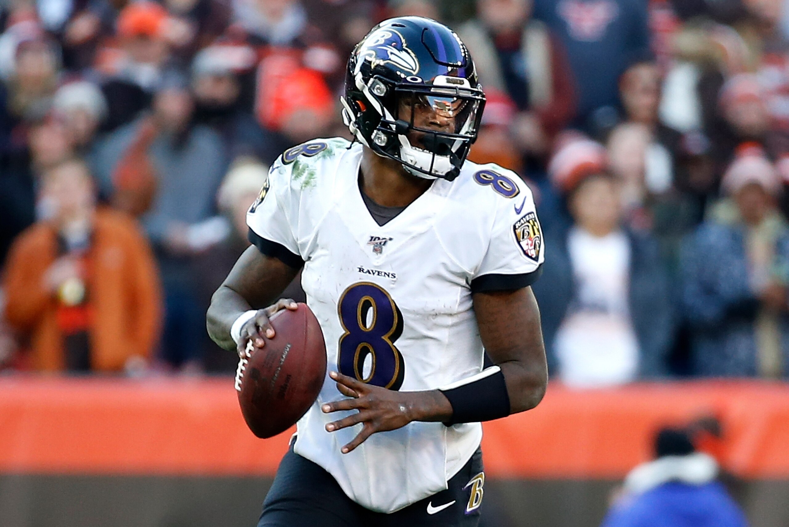 CLEVELAND, OH - DECEMBER 22:  Lamar Jackson #8 of the Baltimore Ravens looks to throw the ball during the game against the Cleveland Browns at FirstEnergy Stadium on December 22, 2019 in Cleveland, Ohio. Baltimore defeated Cleveland 31-15. (Photo by Kirk Irwin/Getty Images)