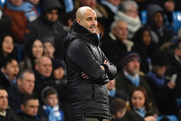 Manchester City's Spanish manager Pep Guardiola looks on during the English FA Cup third round football match between Manchester City and Port Vale at the Etihad Stadium in Manchester, north west England, on January 4, 2020. (Photo by Paul ELLIS / AFP) / RESTRICTED TO EDITORIAL USE. No use with unauthorized audio, video, data, fixture lists, club/league logos or 'live' services. Online in-match use limited to 120 images. An additional 40 images may be used in extra time. No video emulation. Social media in-match use limited to 120 images. An additional 40 images may be used in extra time. No use in betting publications, games or single club/league/player publications. /  (Photo by PAUL ELLIS/AFP via Getty Images)