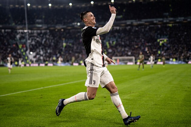 TOPSHOT - Juventus' Portuguese forward Cristiano Ronaldo celebrates after scoring his third goal during the Italian Serie A football match Juventus vs Cagliari on January 6, 2020 at the Juventus Allianz stadium in Turin. (Photo by Marco BERTORELLO / AFP) (Photo by MARCO BERTORELLO/AFP via Getty Images)
