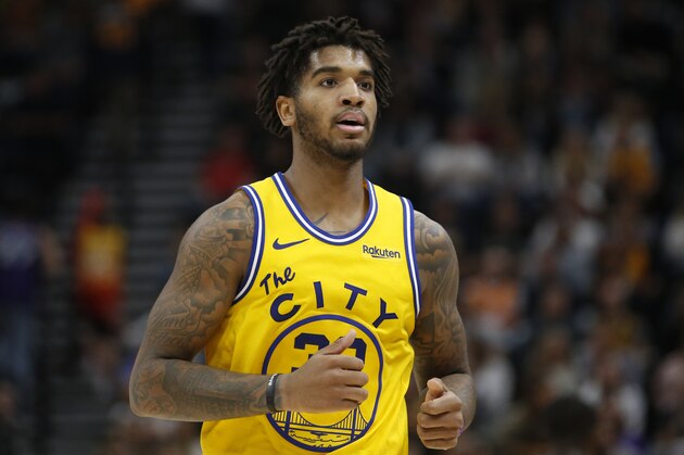 Golden State Warriors forward Marquese Chriss (32) runs up court in the first half during an NBA basketball game against the Utah Jazz Friday, Nov. 22, 2019, in Salt Lake City. (AP Photo/Rick Bowmer)