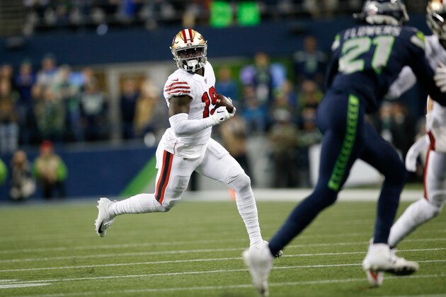 SEATTLE, WA - DECEMBER 29: Deebo Samuel #19 of the San Francisco 49ers rushes for a 30-yard touchdown during the game against the Seattle Seahawks at CenturyLink Field on December 29, 2019 in Seattle, Washington. The 49ers defeated the Seahawks 26-21. (Photo by Michael Zagaris/San Francisco 49ers/Getty Images)