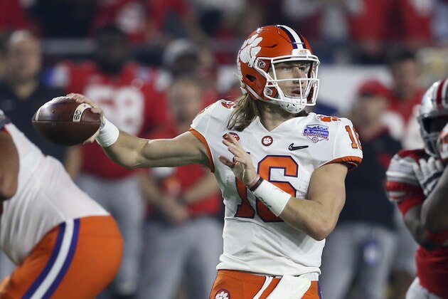 Clemson quarterback Trevor Lawrence throws a pass against Ohio State during the first half of the Fiesta Bowl NCAA college football playoff semifinal Saturday, Dec. 28, 2019, in Glendale, Ariz. (AP Photo/Ross D. Franklin)