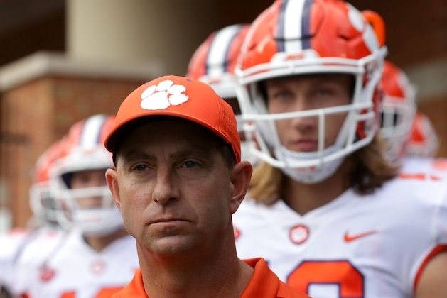 WINSTON SALEM, NC - OCTOBER 06:  Head coach Dabo Swinney of the Clemson Tigers waits to go onto the field ahead of quarterback Trevor Lawrence #16 before their game at BB&T Field on October 6, 2018 in Winston Salem, North Carolina.  (Photo by Streeter Lecka/Getty Images)