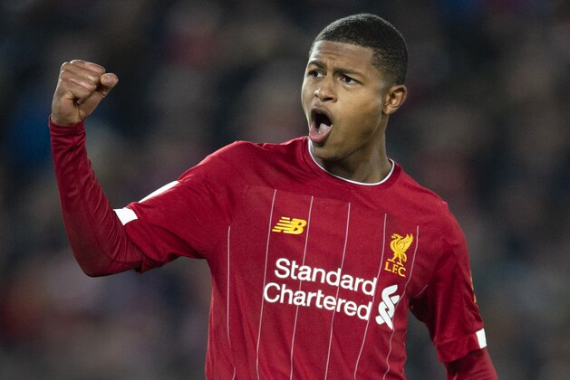 LIVERPOOL, ENGLAND - OCTOBER 30: Rhian Brewster of Liverpool celebrates scoring his penalty during the shoot out during the Carabao Cup Fourth Round match between Liverpool and Arsenal at the Anfield Stadium on October 30, 2019 in Manchester, England. (Photo by Visionhaus)