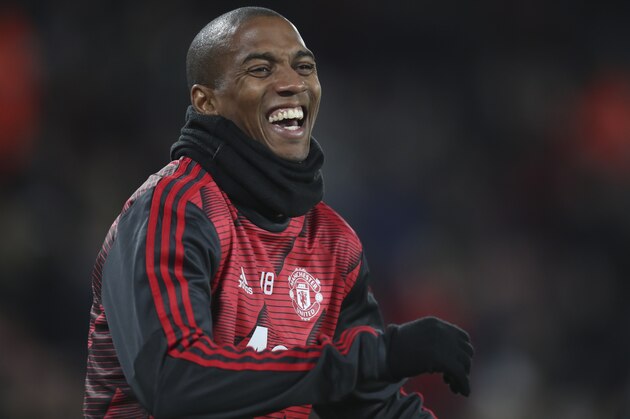Manchester United's Ashley Young smiles before the English Premier League soccer match between Sheffield United and Manchester United at Bramall Lane Stadium in Sheffield, England, Sunday, Nov. 24, 2019. (AP Photo/Jon Super)