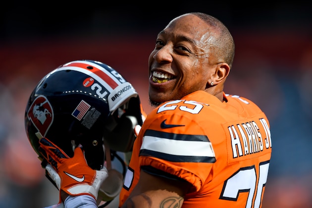 DENVER, CO - DECEMBER 22:  Chris Harris #25 of the Denver Broncos smiles as players warm up before a game against the Detroit Lions at Empower Field at Mile High on December 22, 2019 in Denver, Colorado.  (Photo by Dustin Bradford/Getty Images)