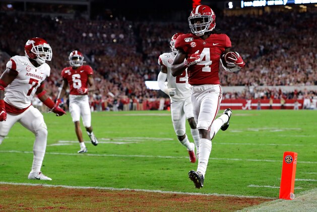TUSCALOOSA, ALABAMA - OCTOBER 26:  Jerry Jeudy #4 of the Alabama Crimson Tide carries this reception in for a touchdown in the first half against the Arkansas Razorbacks at Bryant-Denny Stadium on October 26, 2019 in Tuscaloosa, Alabama. (Photo by Kevin C. Cox/Getty Images)