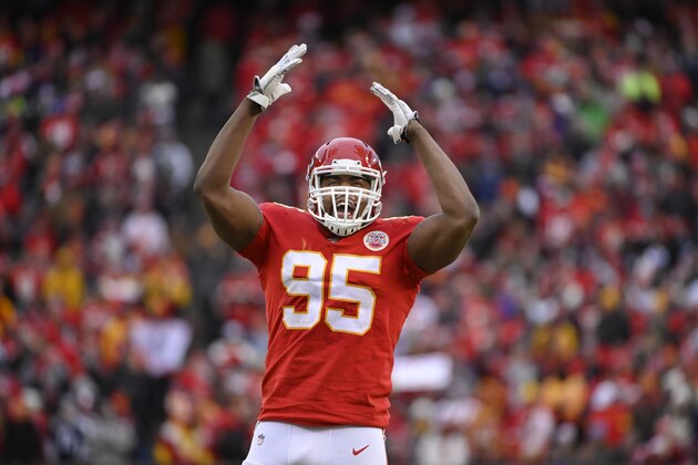 Kansas City Chiefs defensive end Chris Jones (95) fires up the crowd against the Los Angeles Chargers during the second half of an NFL football game in Kansas City, Mo., Sunday, Dec. 29, 2019. (AP Photo/Reed Hoffmann)