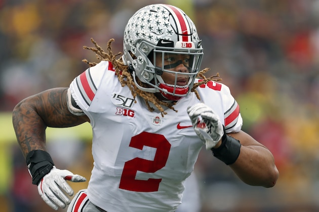 FILE - In this Nov. 30, 2019, file photo, Ohio State defensive end Chase Young plays against Michigan in the first half of an NCAA college football game, in Ann Arbor, Mich. Record-setting defensive end Chase Young is leaving Ohio State early to enter the NFL draft, a widely expected move. The junior Heisman Trophy finalist made the announcement Friday, Jan. 3, 2020, on Twitter. He says he looks forward to FILE - In this Nov. 30, 2019, file photo, Ohio State defensive end Chase Young plays against Michigan in the first half of an NCAA college football game, in Ann Arbor, Mich. Record-setting defensive end Chase Young is leaving Ohio State early to enter the NFL draft, a widely expected move. The junior Heisman Trophy finalist made the announcement Friday, Jan. 3, 2020, on Twitter. He says he looks forward to