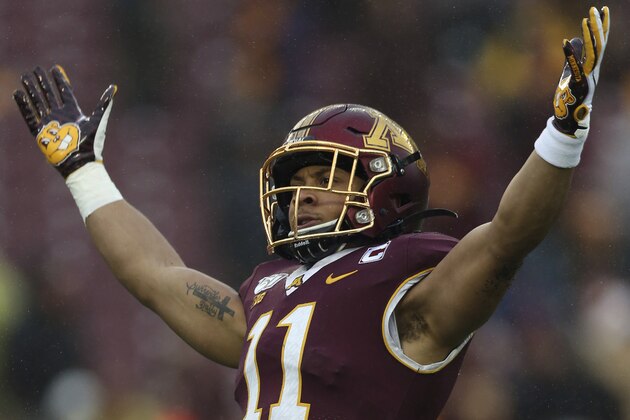 FILE - In this Nov. 30, 2019, file photo. Minnesota defensive back Antoine Winfield Jr. (11) gestures during an NCAA college football game against Wisconsin, in Minneapolis. Winfield was selected to The Associated Press All-America team, Monday, Dec. 16, 2019. (AP Photo/Stacy Bengs, File)