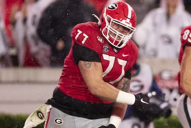 ATHENS, GA - OCTOBER 19: Cade Mays #77 of the Georgia Bulldogs celebrates D'Andre Swift