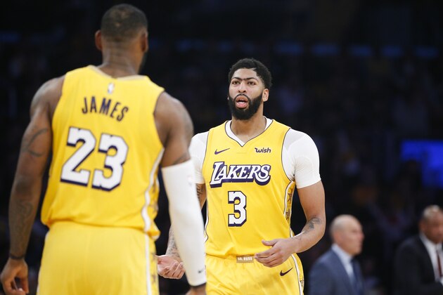 Los Angeles Lakers' Anthony Davis (3) and Los Angeles Lakers' LeBron James (23) in an NBA basketball game between Los Angeles Lakers and Los Angeles Clippers, Wednesday, Dec. 25, 2019, in Los Angeles. The Clippers won 111-106. (AP Photo/Ringo H.W. Chiu) Los Angeles Lakers' Anthony Davis (3) and Los Angeles Lakers' LeBron James (23) in an NBA basketball game between Los Angeles Lakers and Los Angeles Clippers, Wednesday, Dec. 25, 2019, in Los Angeles. The Clippers won 111-106. (AP Photo/Ringo H.W. Chiu)