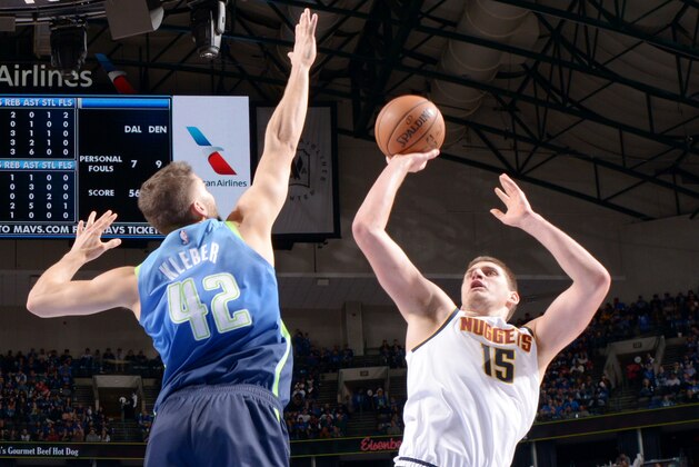 DALLAS, TX - JANUARY 8: Nikola Jokic #15 of the Denver Nuggets shoots the ball against the Dallas Mavericks on January 8, 2020 at the American Airlines Center in Dallas, Texas. NOTE TO USER: User expressly acknowledges and agrees that, by downloading and or using this photograph, User is consenting to the terms and conditions of the Getty Images License Agreement. Mandatory Copyright Notice: Copyright 2020 NBAE (Photo by Glenn James/NBAE via Getty Images)