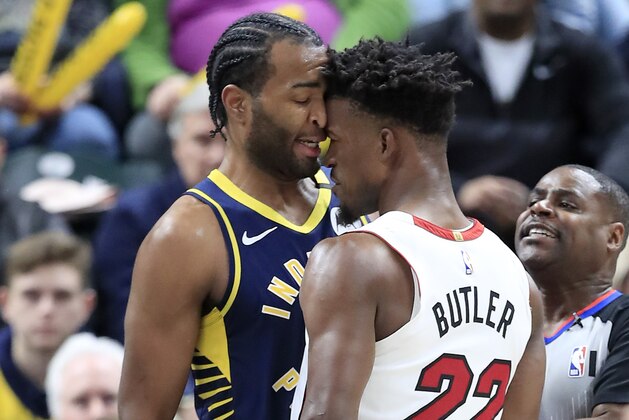 INDIANAPOLIS, INDIANA - JANUARY 08:  Jimmy Butler #22 of the Miami Heat and T.J. Warren #1 of  the Indiana Pacers get involved in an argument during the game at Bankers Life Fieldhouse on January 08, 2020 in Indianapolis, Indiana.    NOTE TO USER: User expressly acknowledges and agrees that, by downloading and or using this photograph, User is consenting to the terms and conditions of the Getty Images License Agreement. (Photo by Andy Lyons/Getty Images)