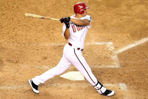 PHOENIX - AUGUST 12:  Alex Romero #28 of the Arizona Diamondbacks bats against the New York Mets during the major league baseball game at Chase Field on August 12, 2009 in Phoenix, Arizona. The Mets defeated the Diamondbacks 6-4.  (Photo by Christian Petersen/Getty Images)