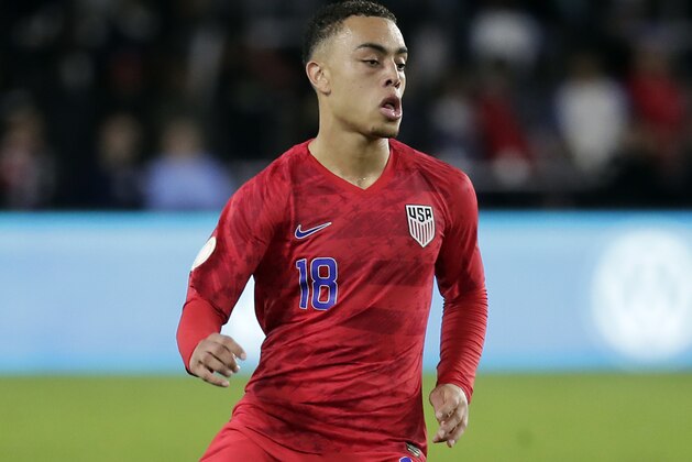 United States defender Sergino Dest moves the ball against Canada during the second half of a CONCACAF Nations League soccer match Friday, Nov. 15, 2019, in Orlando, Fla. (AP Photo/John Raoux)