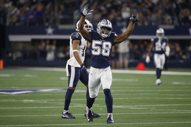 Dallas Cowboys defensive end Robert Quinn (58) reacts during an NFL football game against the Los Angeles Rams in Arlington, Texas, Sunday, Dec. 15, 2019. (AP Photo/Ron Jenkins)