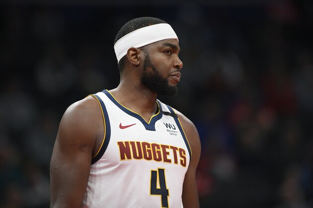 Denver Nuggets forward Paul Millsap (4) stands on the court during the second half of an NBA basketball game against the Washington Wizards, Saturday, Jan. 4, 2020, in Washington. The Wizards won 128-114. (AP Photo/Nick Wass) Denver Nuggets forward Paul Millsap (4) stands on the court during the second half of an NBA basketball game against the Washington Wizards, Saturday, Jan. 4, 2020, in Washington. The Wizards won 128-114. (AP Photo/Nick Wass)