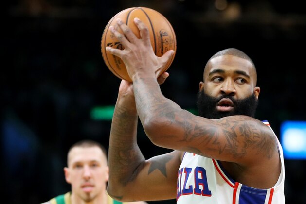 BOSTON, MASSACHUSETTS - DECEMBER 12: Kyle O'Quinn #9 of the Philadelphia 76ers looks for a pass during the game against the Boston Celtics at TD Garden on December 12, 2019 in Boston, Massachusetts.  The 76ers defeat the Celtics 115-109. NOTE TO USER: User expressly acknowledges and agrees that, by downloading and or using this photograph, User is consenting to the terms and conditions of the Getty Images License Agreement.  (Photo by Maddie Meyer/Getty Images)