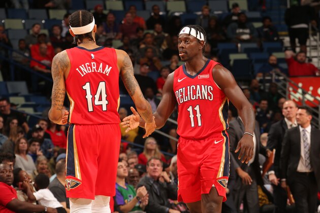 NEW ORLEANS, LA - NOVEMBER 19: Jrue Holiday #11 of the New Orleans Pelicans and Brandon Ingram #14 of the New Orleans Pelicans celebrate during the game against the Portland Trail Blazers on November 19, 2019 at Smoothie King Center in New Orleans, Louisiana. NOTE TO USER: User expressly acknowledges and agrees that, by downloading and/or using this photograph, User is consenting to the terms and conditions of the Getty Images License Agreement. Mandatory Copyright Notice: Copyright 2019 NBAE (Photo by Layne Murdoch Jr./NBAE via Getty Images)