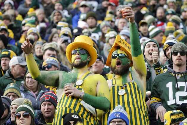 Fans cheer at Lambeau Field during the first half of an NFL football game between the Green Bay Packers and the Washington Redskins Sunday, Dec. 8, 2019, in Green Bay, Wis. (AP Photo/Mike Roemer)