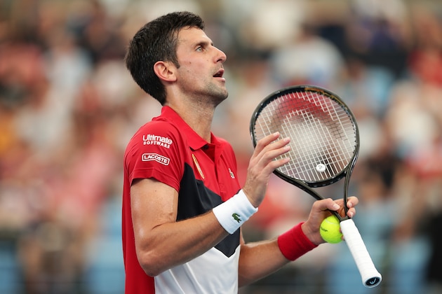 SYDNEY, AUSTRALIA - JANUARY 10: Novak Djokovic of Serbia speaks to the umpire during his quarter final singles match against Denis Shapovalov of Canada during day eight of the 2020 ATP Cup at Ken Rosewall Arena on January 10, 2020 in Sydney, Australia. (Photo by Mark Metcalfe/Getty Images)