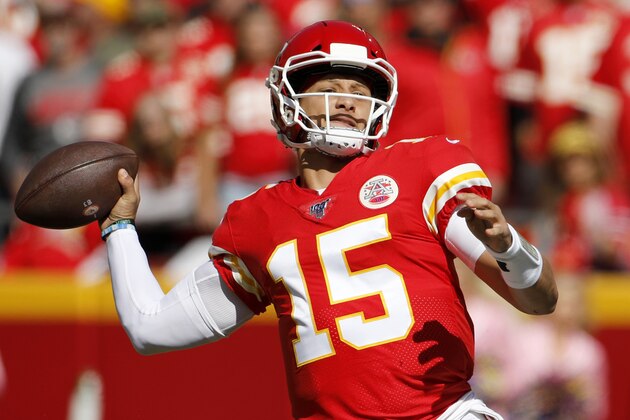 Kansas City Chiefs quarterback Patrick Mahomes (15) throws a pass during the first half of an NFL football game against the Houston Texans in Kansas City, Mo., Sunday, Oct. 13, 2019. (AP Photo/Colin E. Braley)