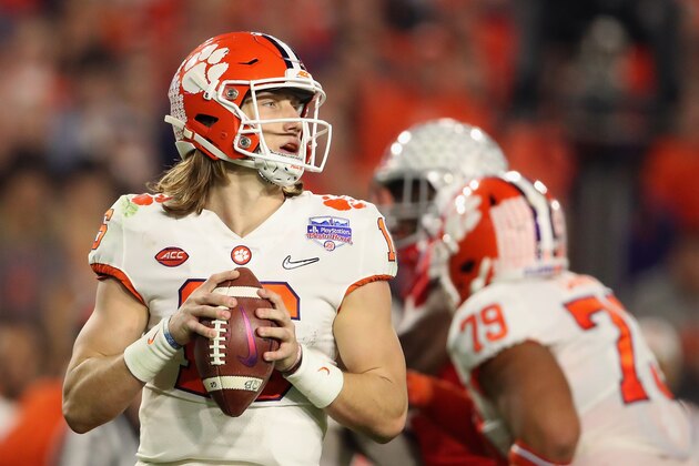 GLENDALE, ARIZONA - DECEMBER 28: Quarterback Trevor Lawrence #16 of the Clemson Tigers drops back to pass during the PlayStation Fiesta Bowl against the Ohio State Buckeyes at State Farm Stadium on December 28, 2019 in Glendale, Arizona. The Tigers defeated the Buckeyes 29-23. (Photo by Christian Petersen/Getty Images)
