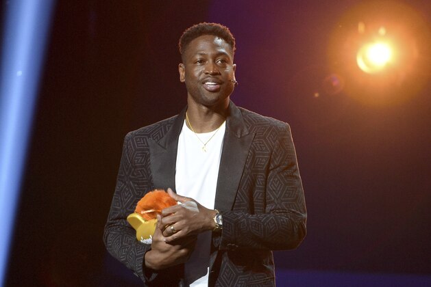 Dwyane Wade accepts the legend award at the Kids' Choice Sports Awards on Thursday, July 11, 2019, at the Barker Hangar in Santa Monica, Calif. (Photo by Chris Pizzello/Invision/AP)