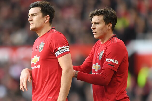 MANCHESTER, ENGLAND - NOVEMBER 10: Harry Maguire and Victor Lindelof of Manchester United look on during the Premier League match between Manchester United and Brighton & Hove Albion at Old Trafford on November 10, 2019 in Manchester, United Kingdom. (Photo by Michael Regan/Getty Images)