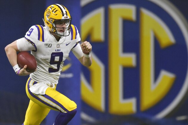 FILE - In this Dec. 7, 2019, file photo, LSU quarterback Joe Burrow (9) runs against Georgia during the second half of the Southeastern Conference championship NCAA college football game, in Atlanta. Burrow is a hero on LSU's Baton Rouge campus, but he hasn't seen much of it because he took graduate courses online. (AP Photo/Mike Stewart, File) FILE - In this Dec. 7, 2019, file photo, LSU quarterback Joe Burrow (9) runs against Georgia during the second half of the Southeastern Conference championship NCAA college football game, in Atlanta. Burrow is a hero on LSU's Baton Rouge campus, but he hasn't seen much of it because he took graduate courses online. (AP Photo/Mike Stewart, File)