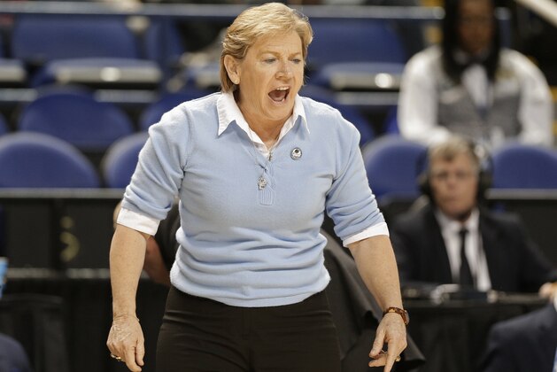 North Carolina head coach Sylvia Hatchell directs her team against South Carolina in the first half of a women's college basketball regional semifinal game in the NCAA Tournament in Greensboro, N.C., Friday, March 27, 2015. (AP Photo/Chuck Burton)