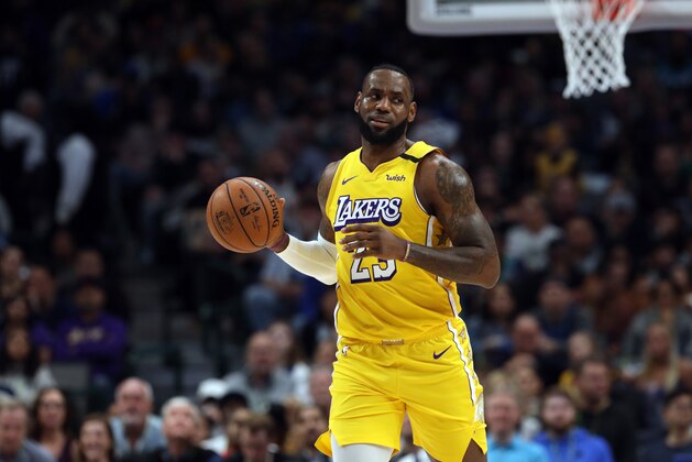 DALLAS, TEXAS - JANUARY 10:   LeBron James #23 of the Los Angeles Lakers dribbles the ball against the Dallas Mavericks at American Airlines Center on January 10, 2020 in Dallas, Texas.  NOTE TO USER: User expressly acknowledges and agrees that, by downloading and or using this photograph, User is consenting to the terms and conditions of the Getty Images License Agreement.  (Photo by Ronald Martinez/Getty Images)