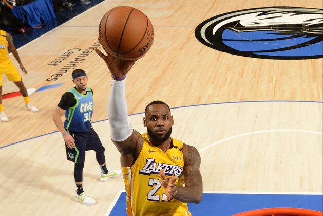 DALLAS, TX - JANUARY 10: LeBron James #23 of the Los Angeles Lakers shoots the ball against the Dallas Mavericks on January 10, 2020 at the American Airlines Center in Dallas, Texas. NOTE TO USER: User expressly acknowledges and agrees that, by downloading and or using this photograph, User is consenting to the terms and conditions of the Getty Images License Agreement. Mandatory Copyright Notice: Copyright 2020 NBAE (Photo by Glenn James/NBAE via Getty Images)