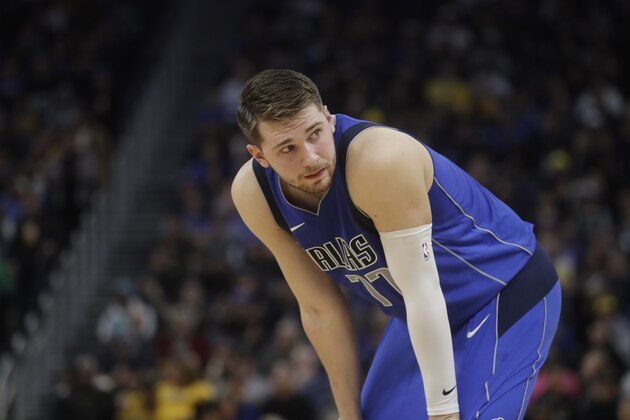 Dallas Mavericks forward Luka Doncic (77) against the Golden State Warriors during an NBA basketball game in San Francisco, Saturday, Dec. 28, 2019. (AP Photo/Jeff Chiu)
